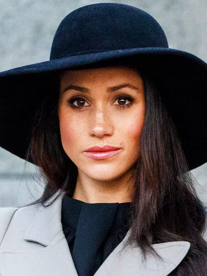 Meghan Markle wearing coat and hat