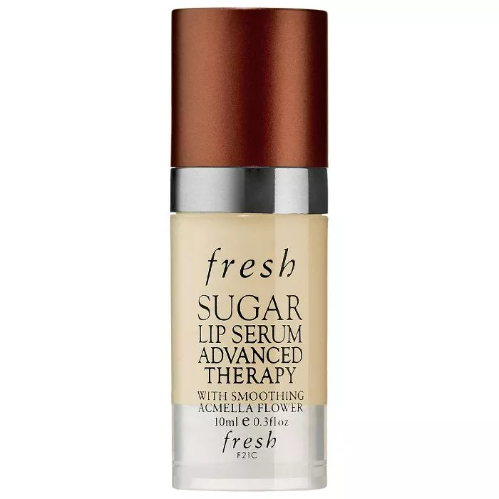 A pump tube of Fresh's Sugar Lip Serum Advanced Therapy