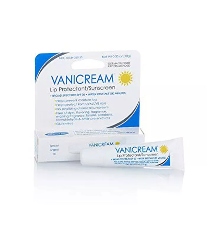 A box of Vanicream Lip Protectant Anti-Aging Lip Treatment with a tube of the treatment lying next to it.