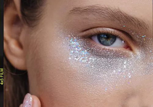 woman with glitter under eyes