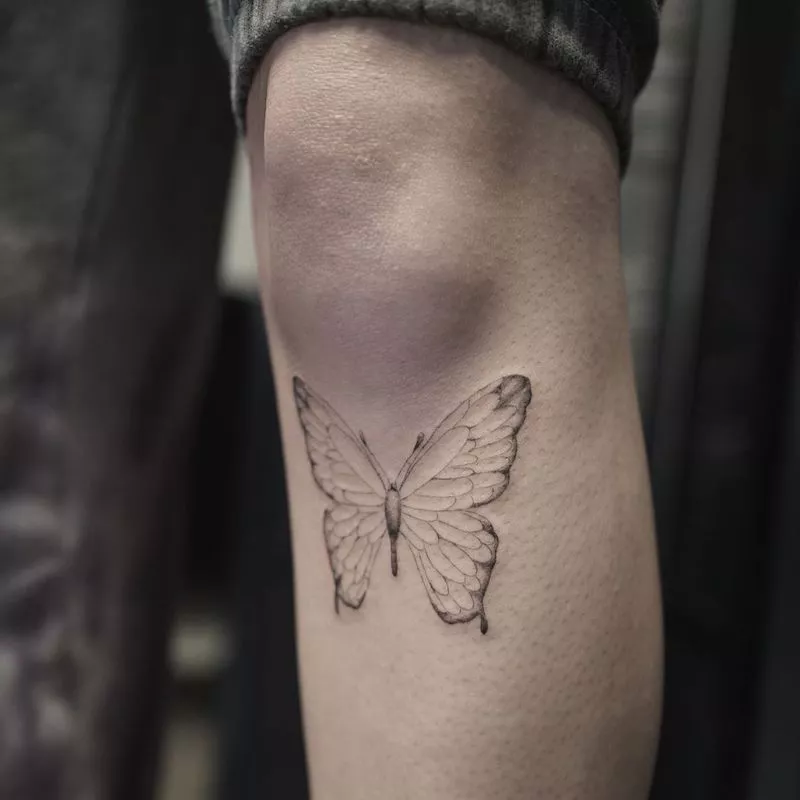 Butterfly tattoo idea on knee