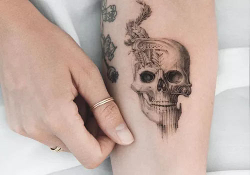 skull tattoo on a forearm