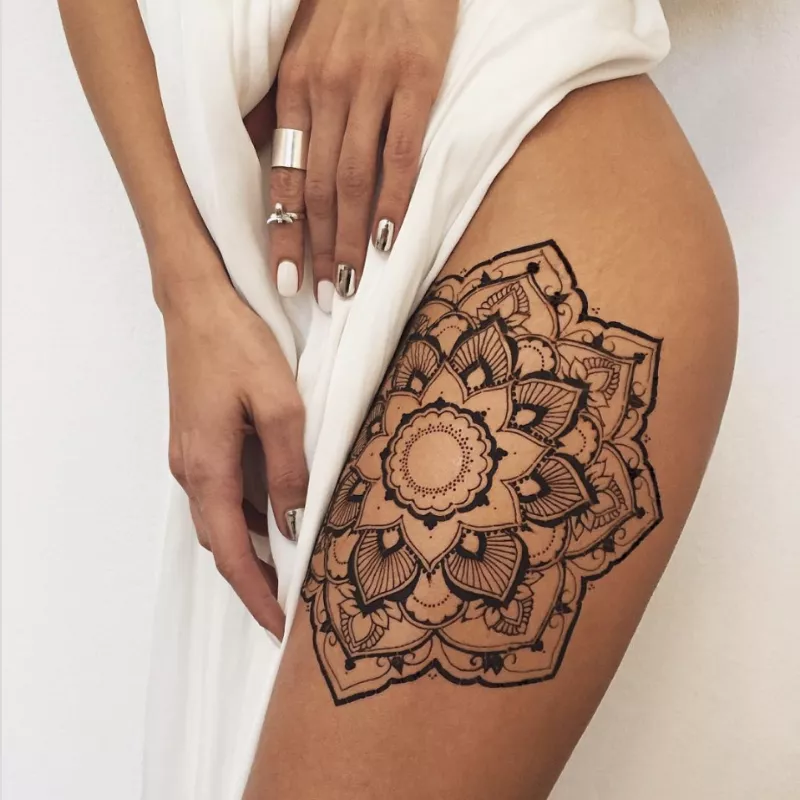 mandala thigh tattoo