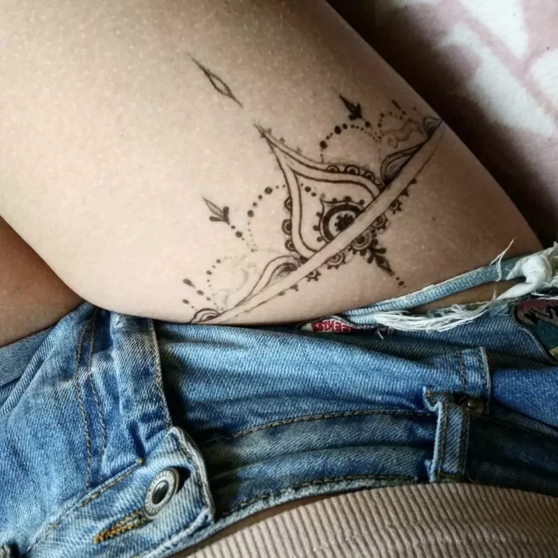 Henna band thigh tattoo