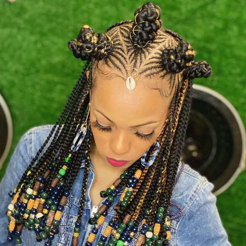 Beaded Fulani braid hairstyle with Bantu knots