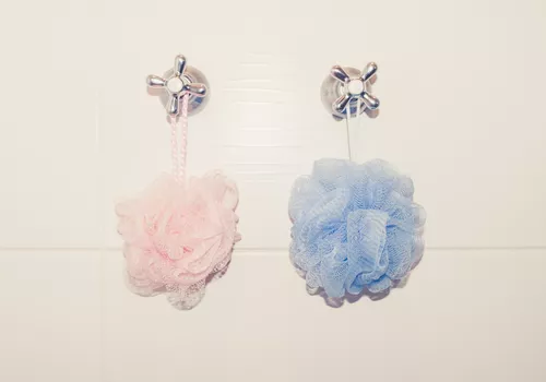 two loofahs in a shower