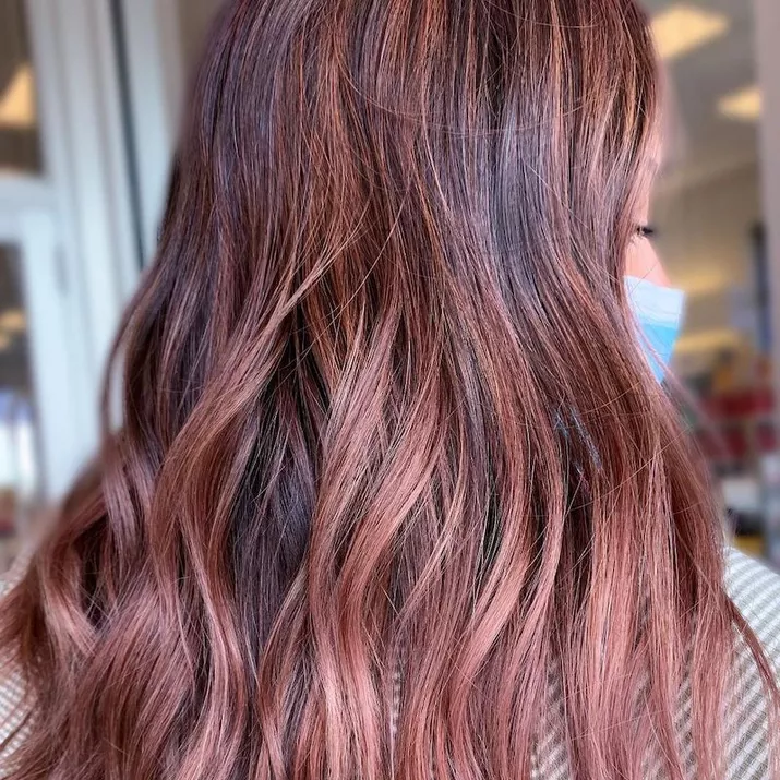 Rose gold hair with violet undertones