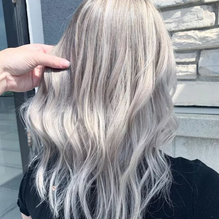 Titanium and platinum loose curls viewed from back