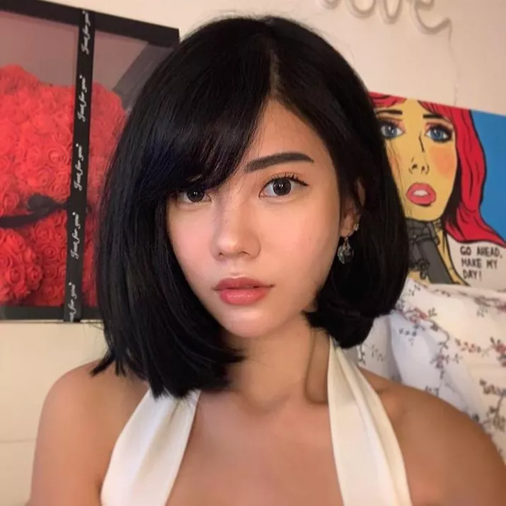 Woman with asymmetrical bob and side bangs