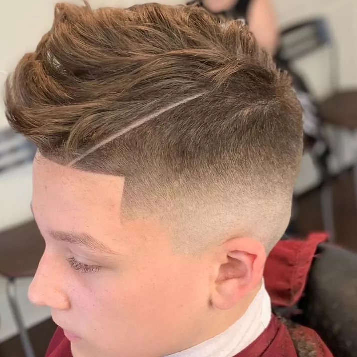 Top view of 1950s-inspired men's haircut with hard side part