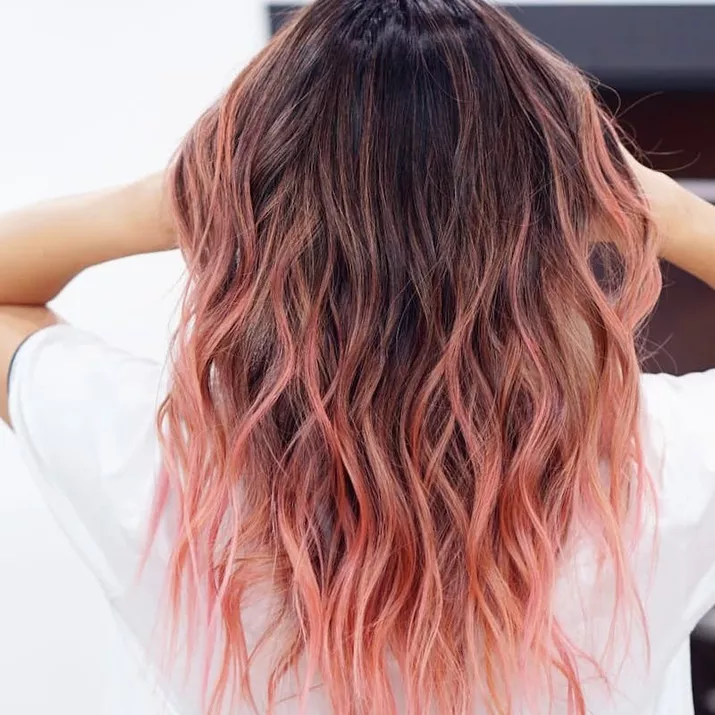 Long, wavy, flamingo pink ombre hair