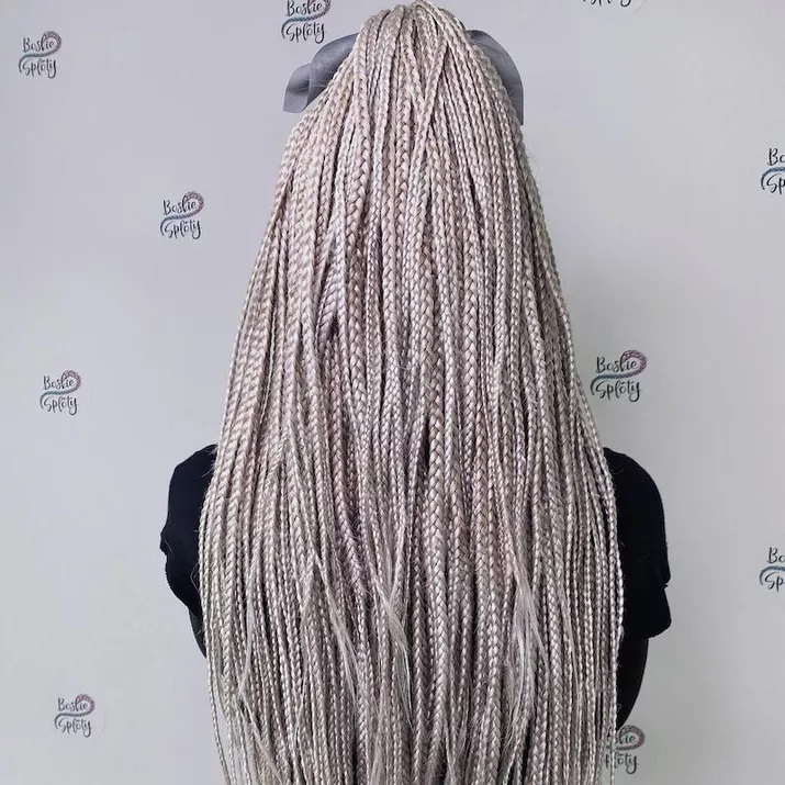 Long set of bright titanium box braids viewed from back