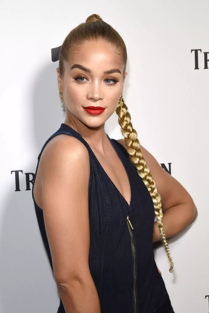 Jasmine Sanders with a long blonde braided high ponytail