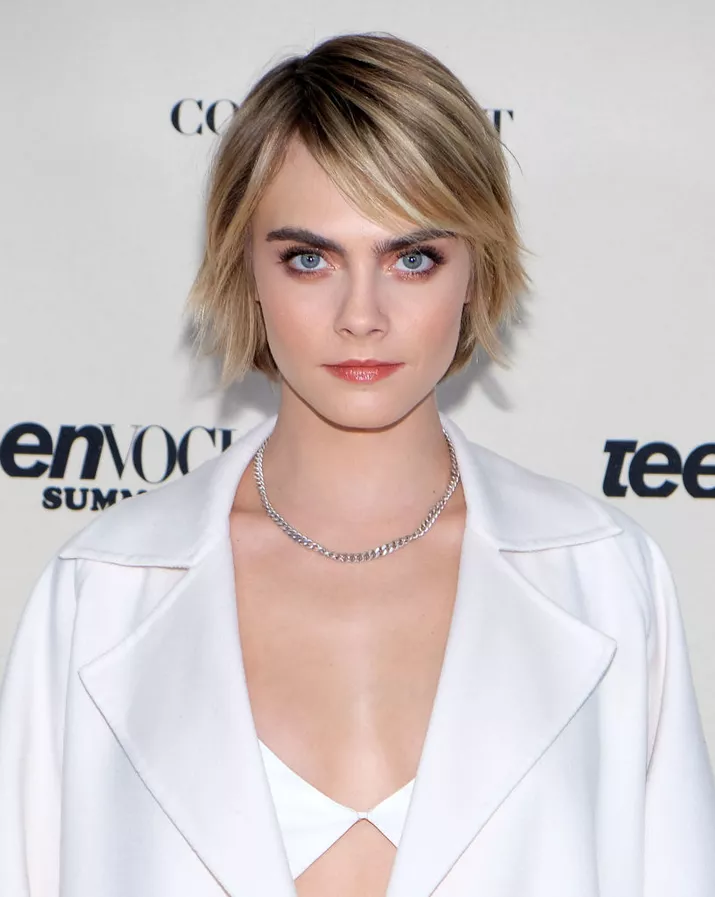 Cara Delevingne with a shaggy bob and side-swept bangs