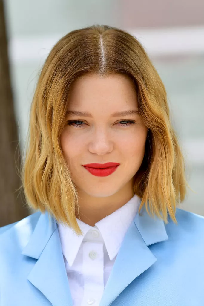 Lea Seydoux wavy tapered lob with red lipstick