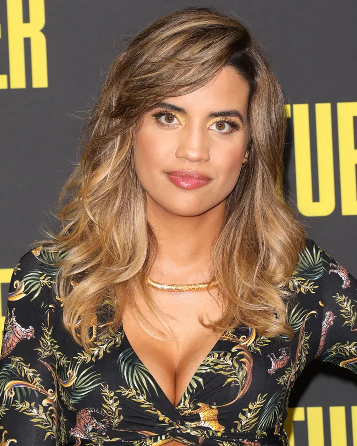Natalie Morales with butterscotch hair.