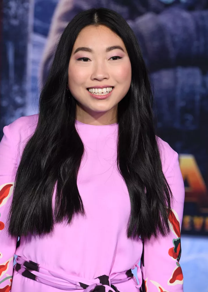 Awkwafina long glossy hair with slight wave