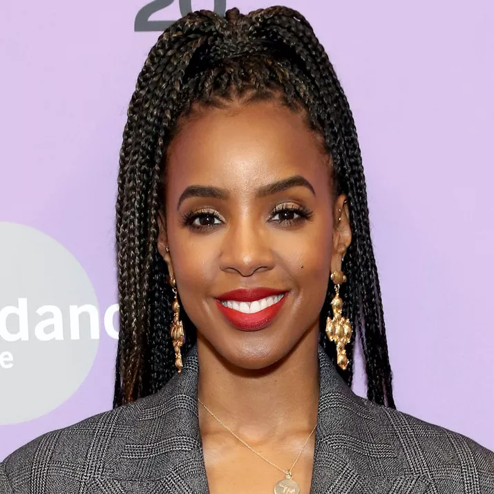 Kelly Rowland wears box braids in a high ponytail