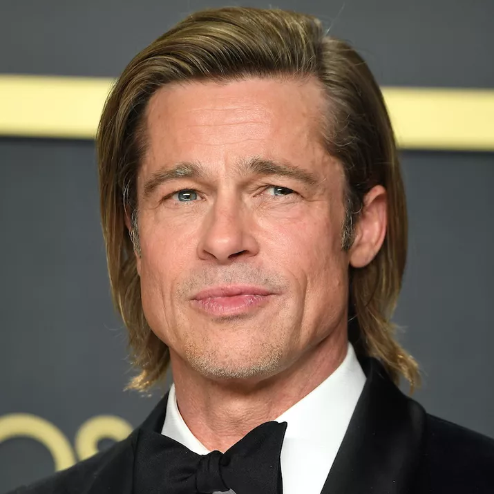Brad Pitt wears long hair with an undercut