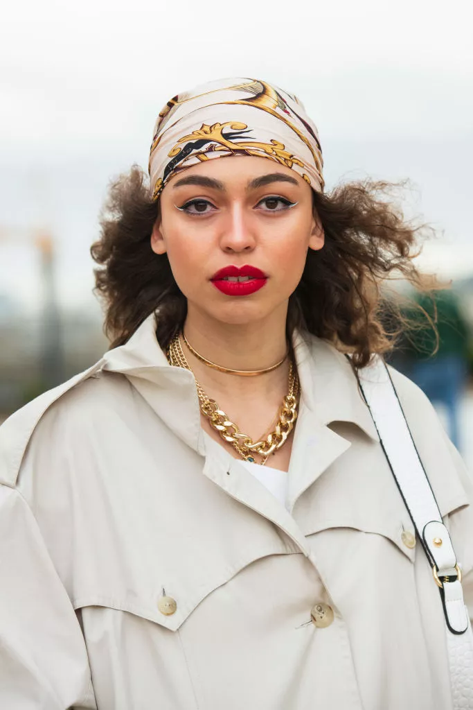 Maria Decremps curly natural hair with silk turban and red lipstick