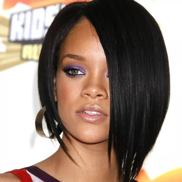 Rihanna wears a straight asymmetrical bob hairstyle