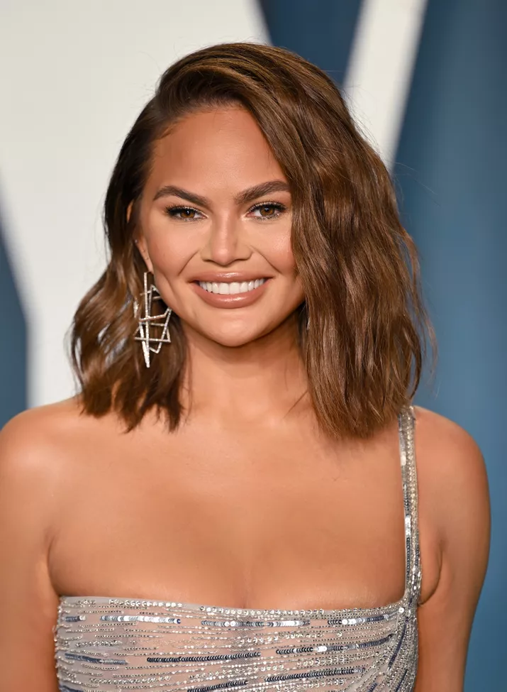 Chrissy Teigen with a lived-in wavy lob