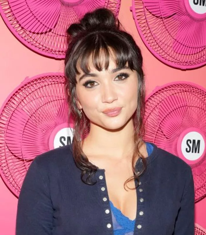 Rowan Blanchard '90s-inspired updo with bangs and double tendrils