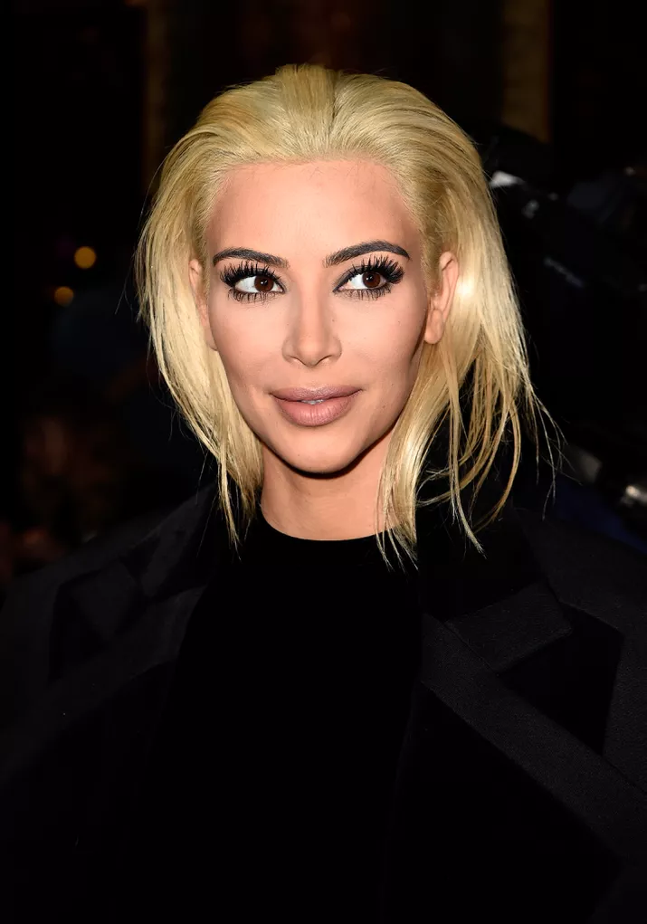 Kim Kardashian blonde, swept-back hair
