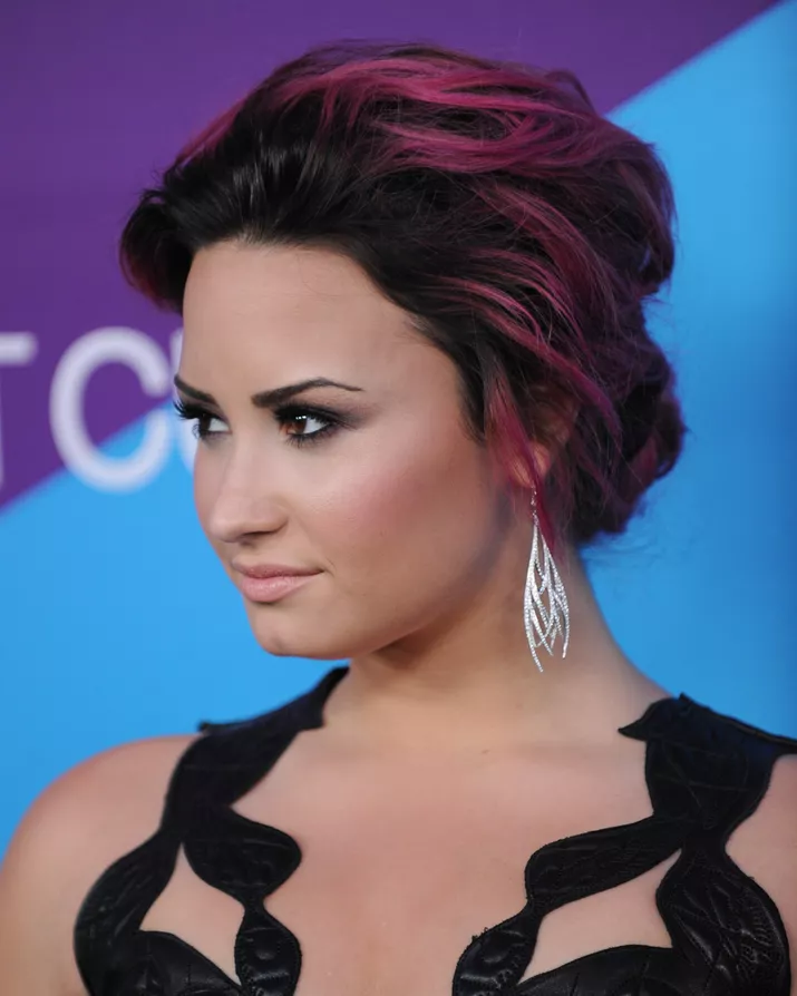 Demi Lovato wears a pink ombre updo