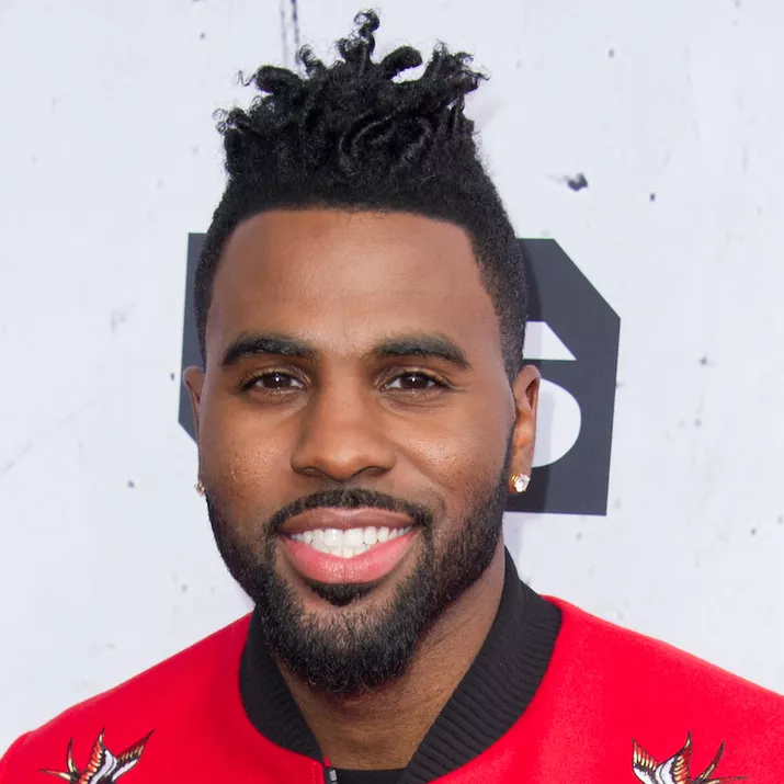 Jason Derulo wears a twisted pompadour hairstyle with undercut