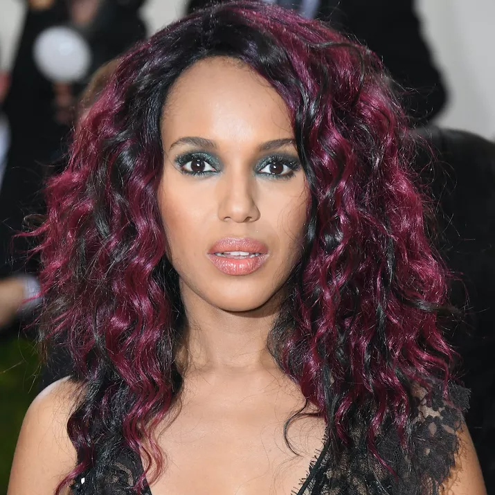 Kerry Washington with burgundy highlights in textured hair