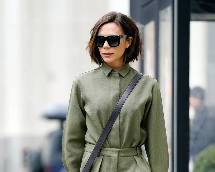 Victoria Beckham wears a tousled bob hairstyle and large sunglasses