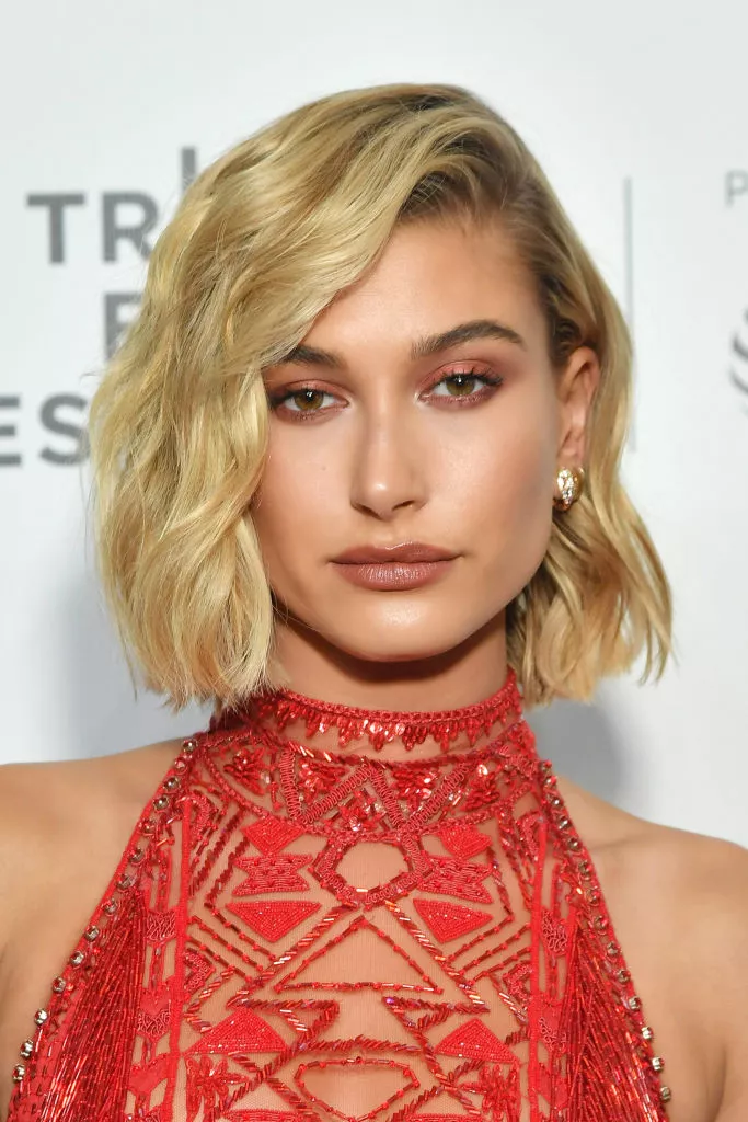 Hailey Baldwin side-parted bob with long layers