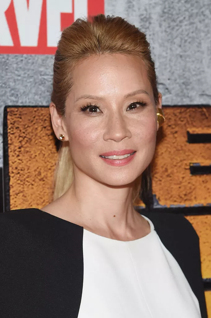 Lucy Liu high blonde pony, lifted at the crown and roots