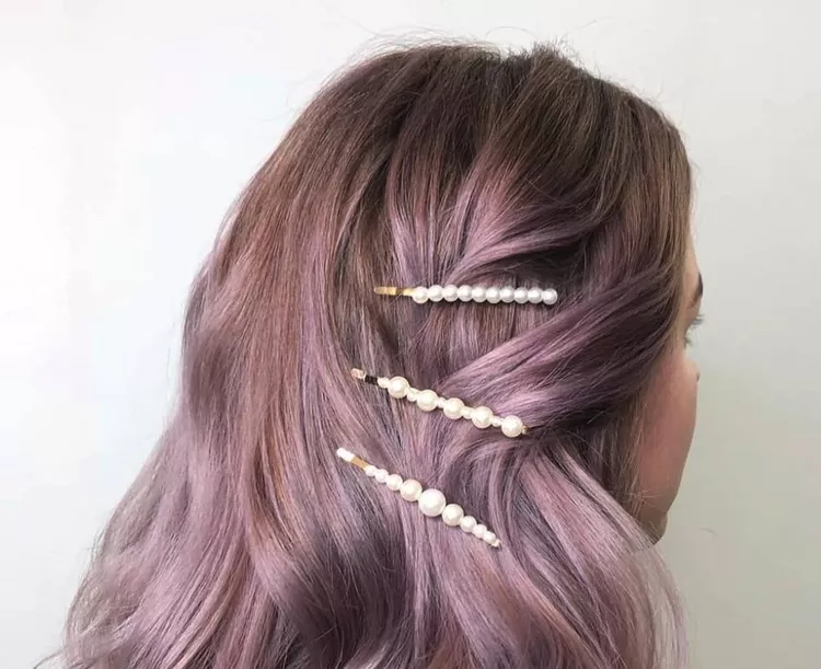 woman with pearl clips in lavender hair