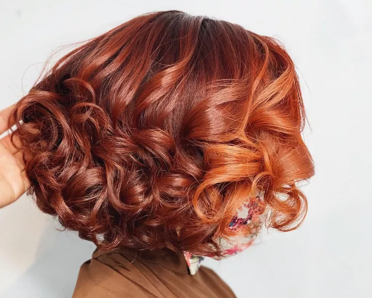 woman with orange ombre hair 