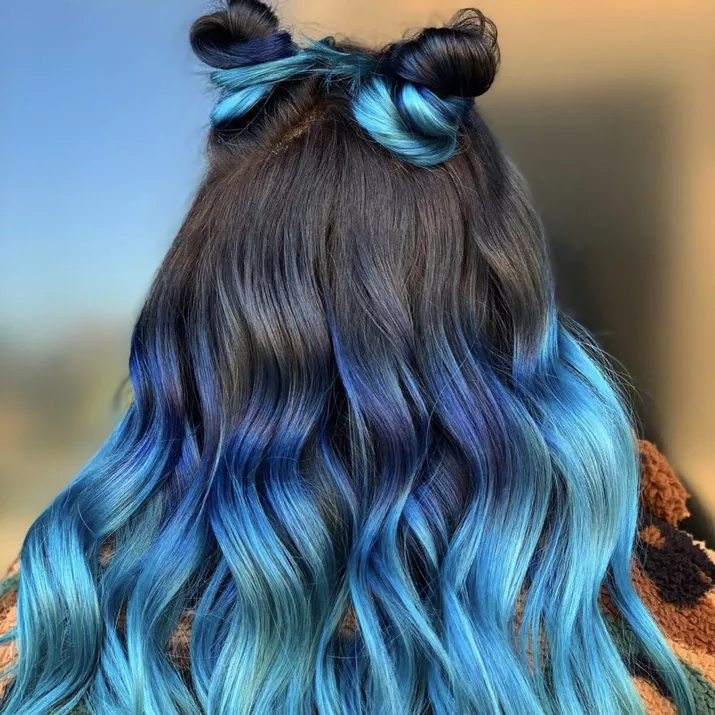 Curled blue ombre hair with double topknots