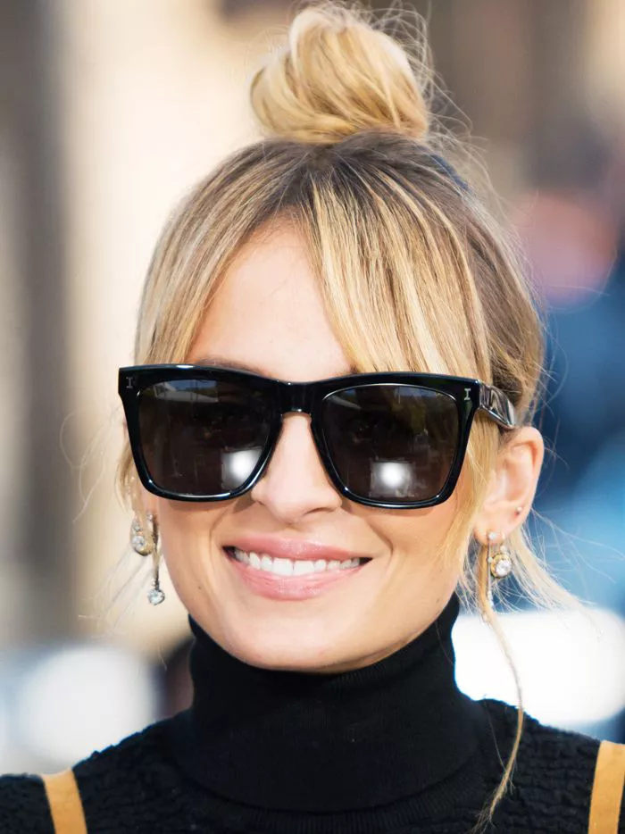 Nicole Richie topknot with curtain bangs