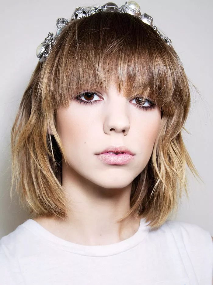 Fringes: Woman With Overgrown Fringe