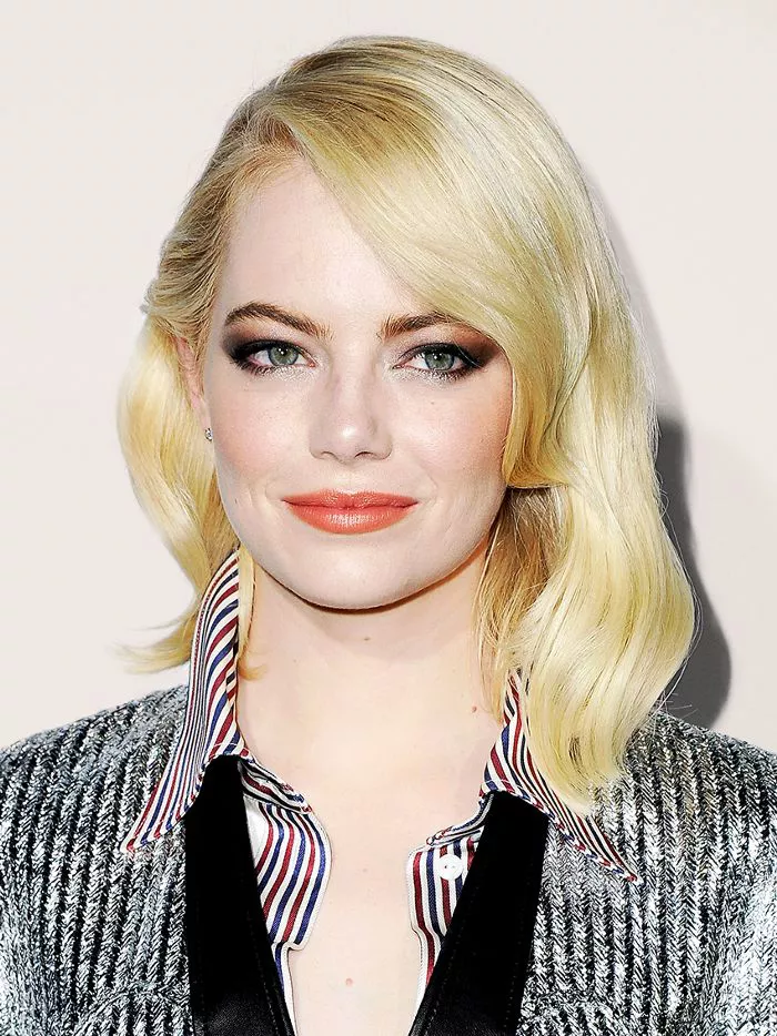 Emma Stone side-parted blonde, mid-length hair
