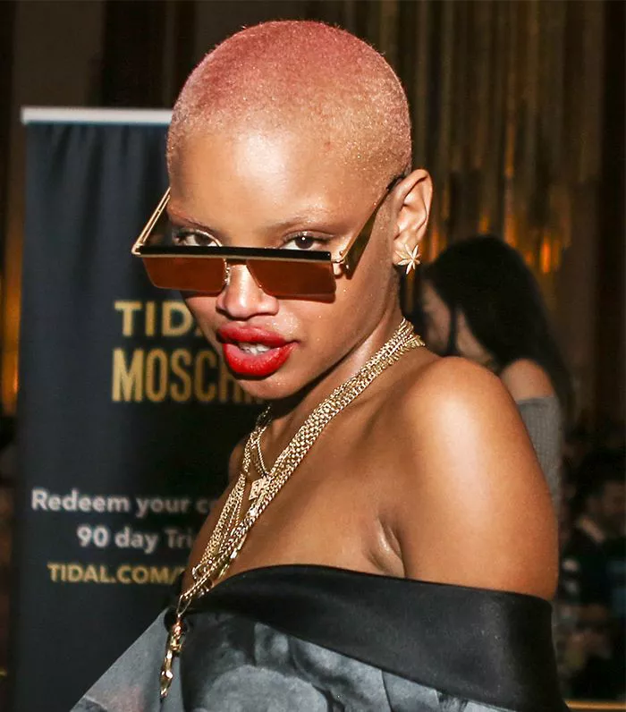 Slick Woods rose-colored buzz cut