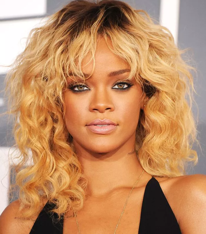 mid length hair with fringe: Rihanna