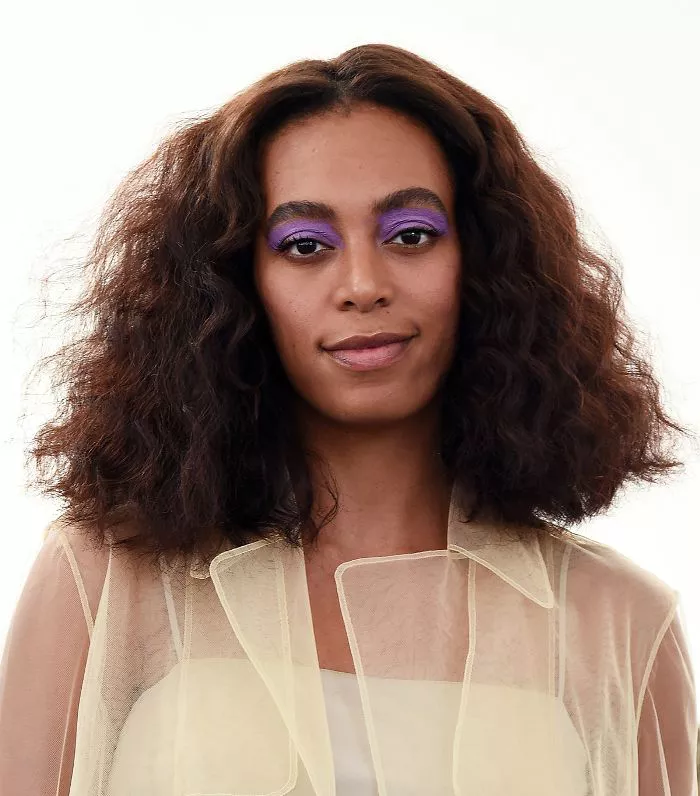 Solange curly natural bob with purple eyeshadow