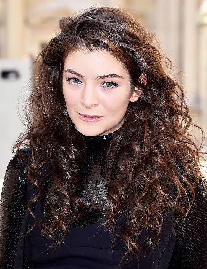 Lorde long, curly hair