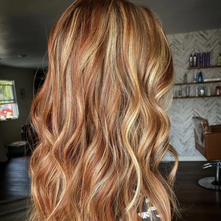 Strawberry blonde hair with gold highlights