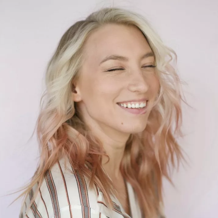 Blonde to pink reverse ombre hairstyle