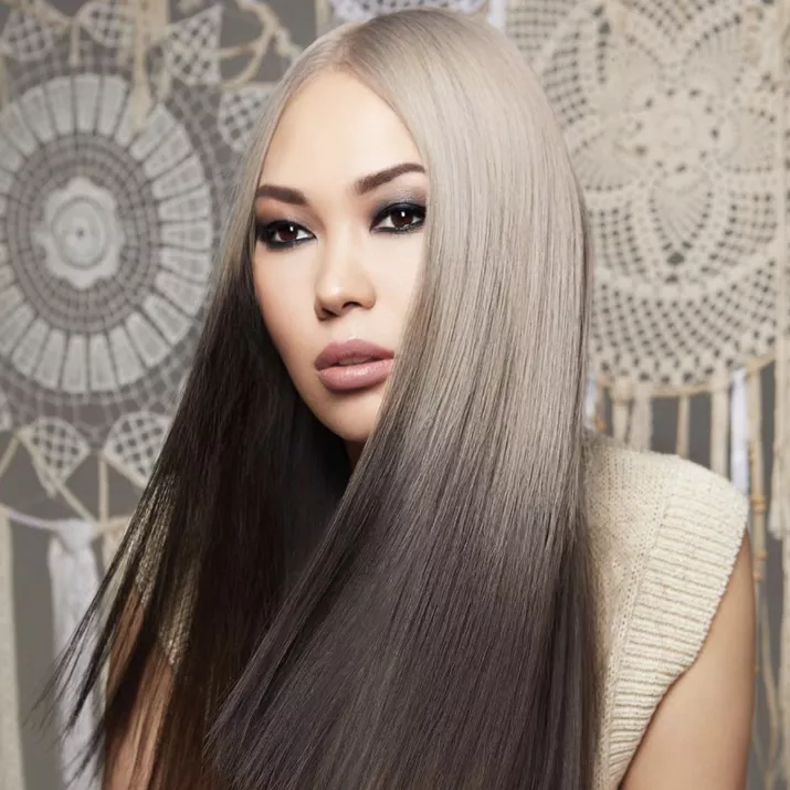woman with platinum to black reverse ombre hair