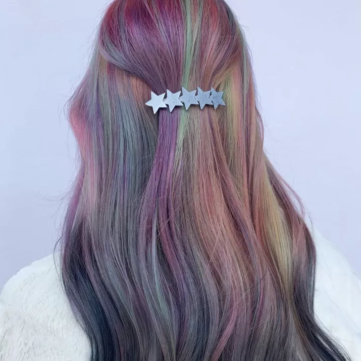 Rainbow to gray reverse ombre hair with star barrette