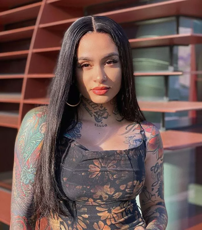 Kehlani middle-parted long, straight hair