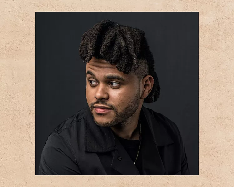 The Weeknd wears long mohawk loc hairstyle with undercut
